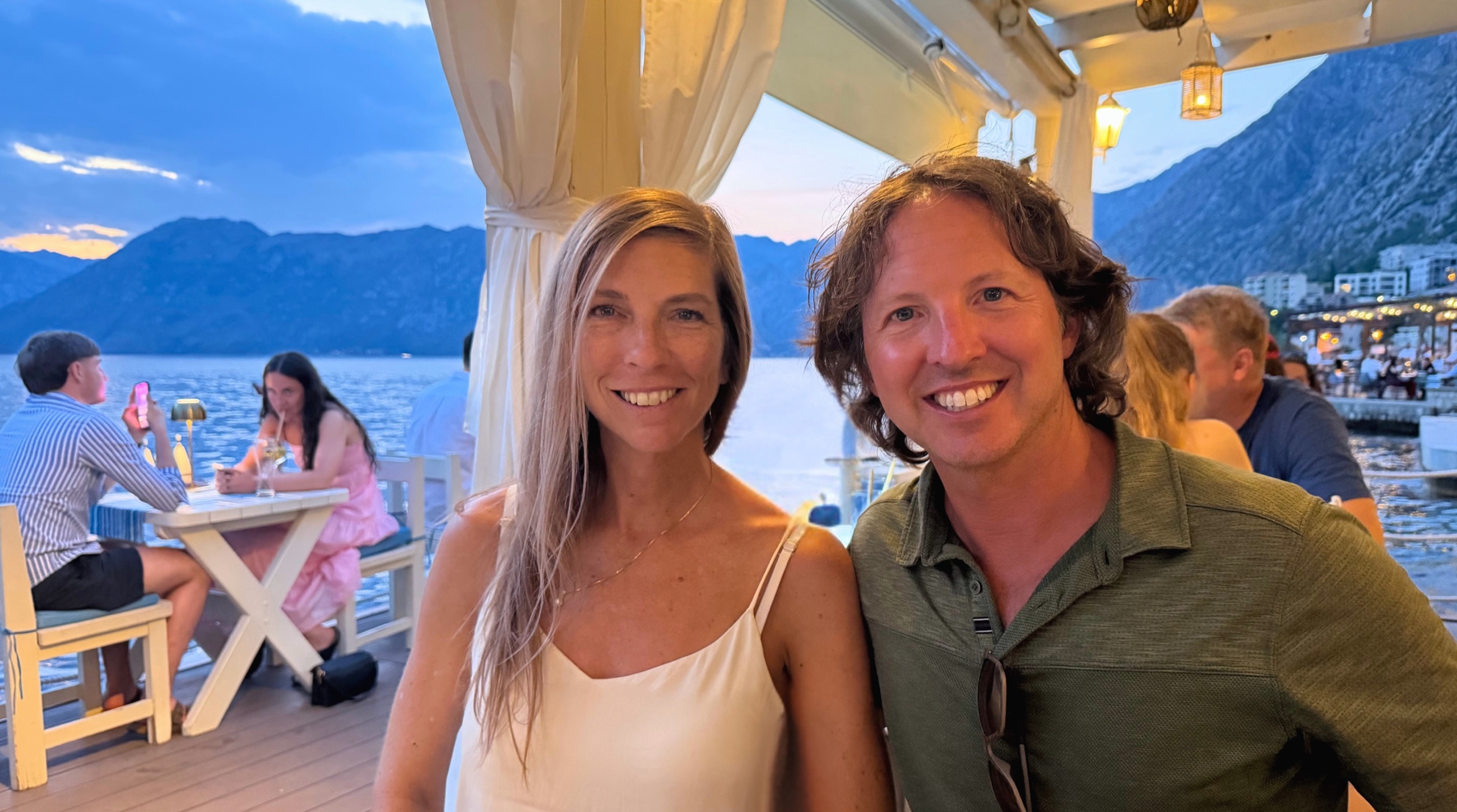 Sam and Stephanie at dinner beside the Bay of Kotor.