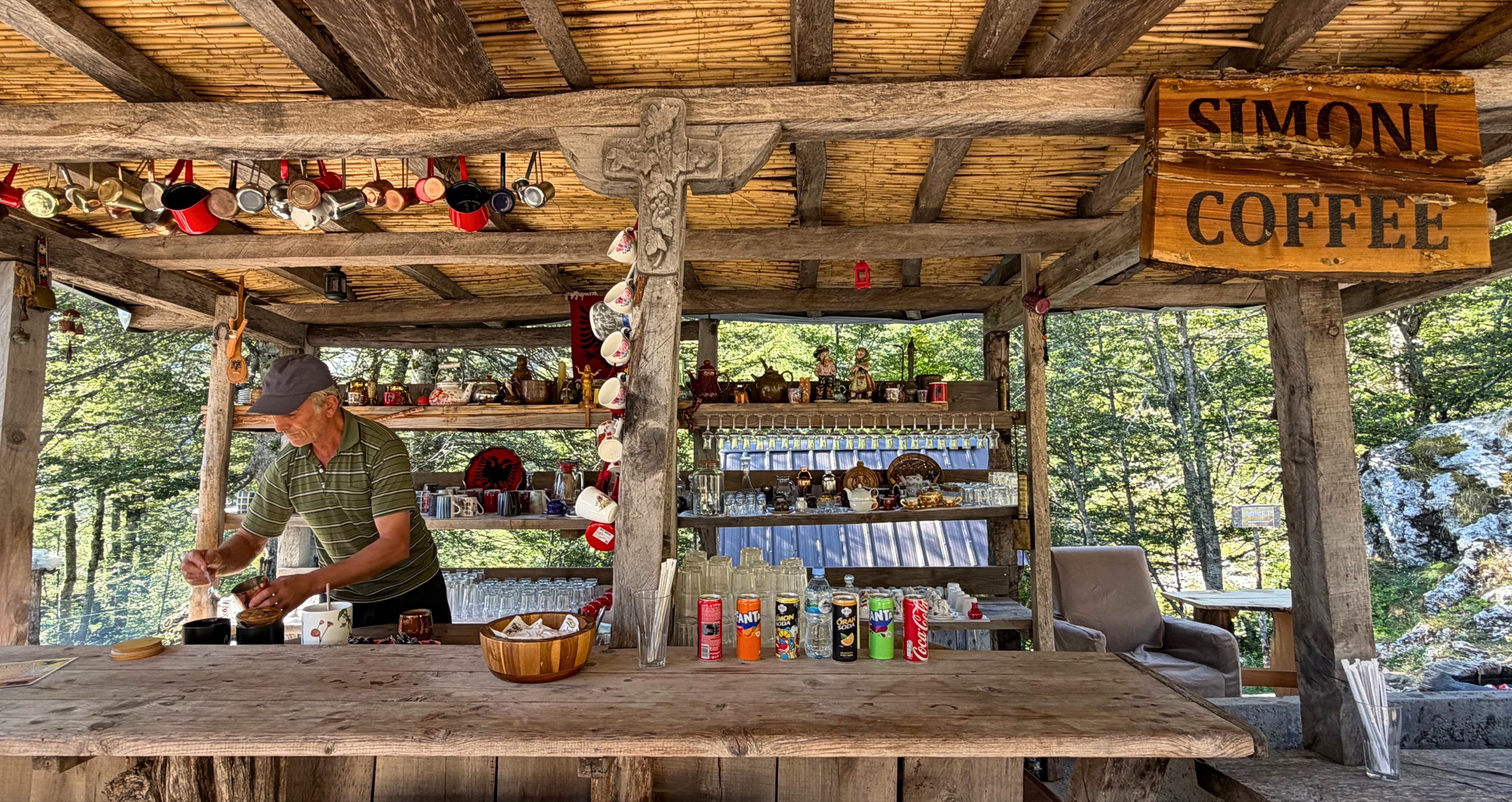 Rustic Simoni Coffee stand along the hiking trail in the Albanian Alps.