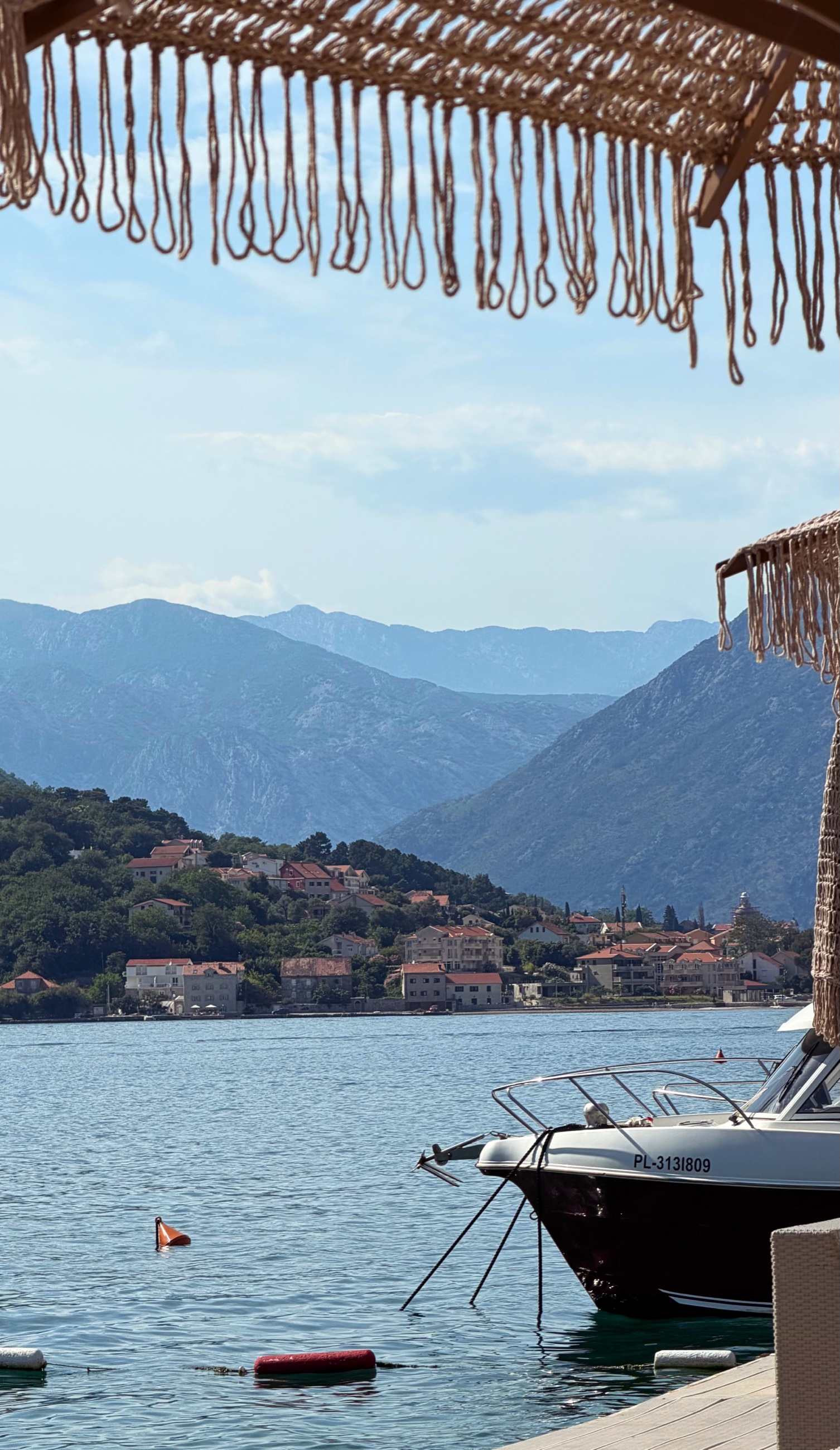 A quiet afternoon at Mandrac beach bar along the Bay of Kotor.