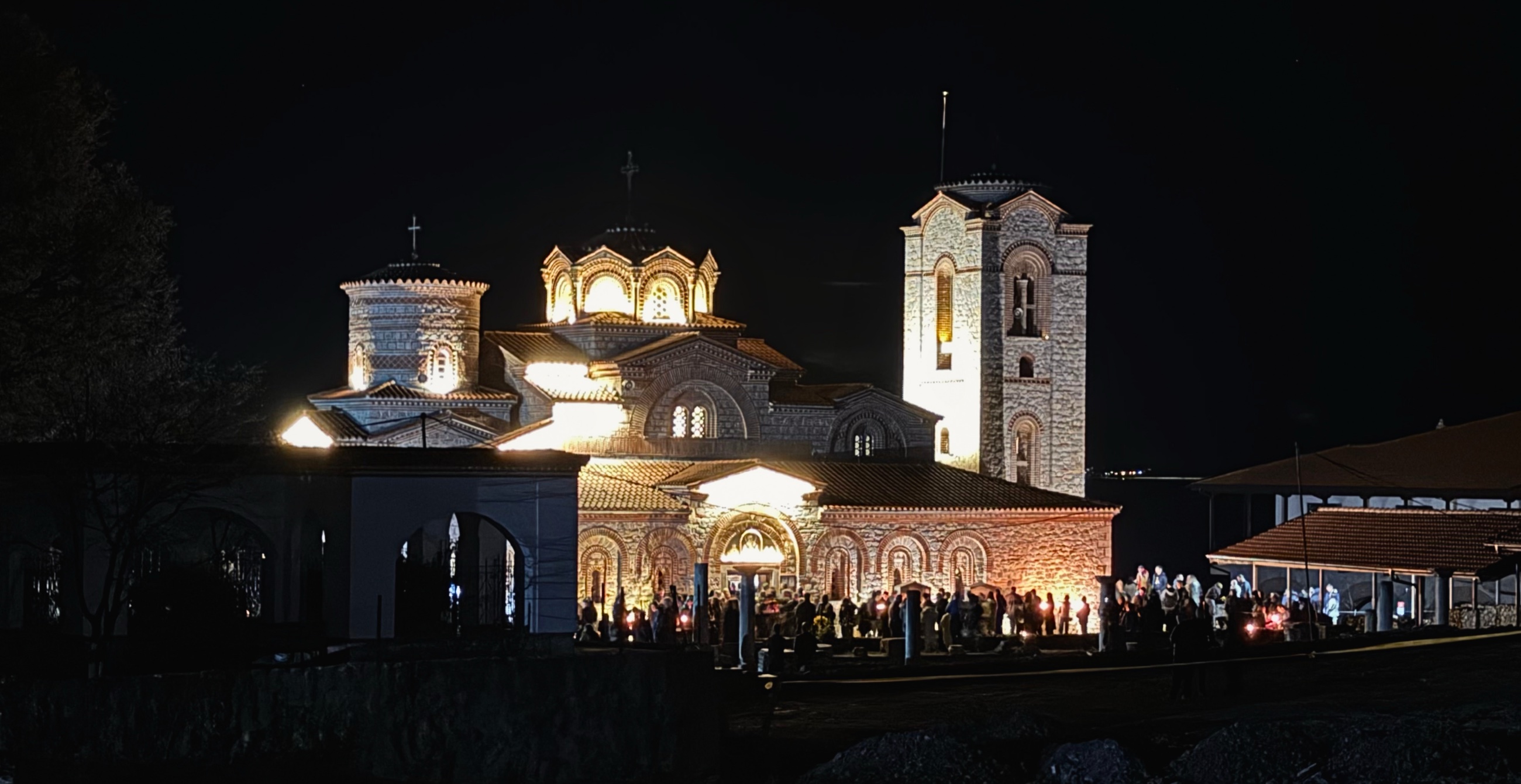 The church of Saints Clement and Panteleimon at Plaošnik lit at night during the Orthodox Easter service.