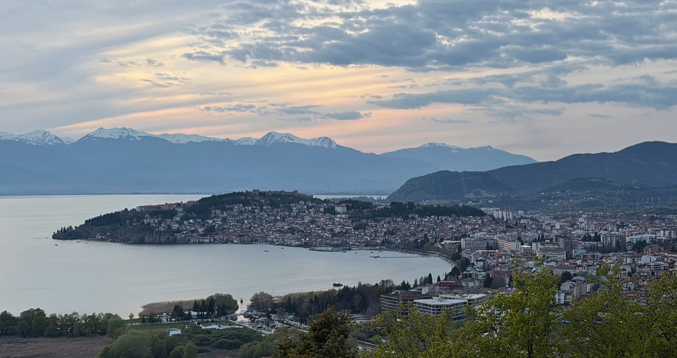 View over Ohrid and Lake Ohrid from the hillside at evening.