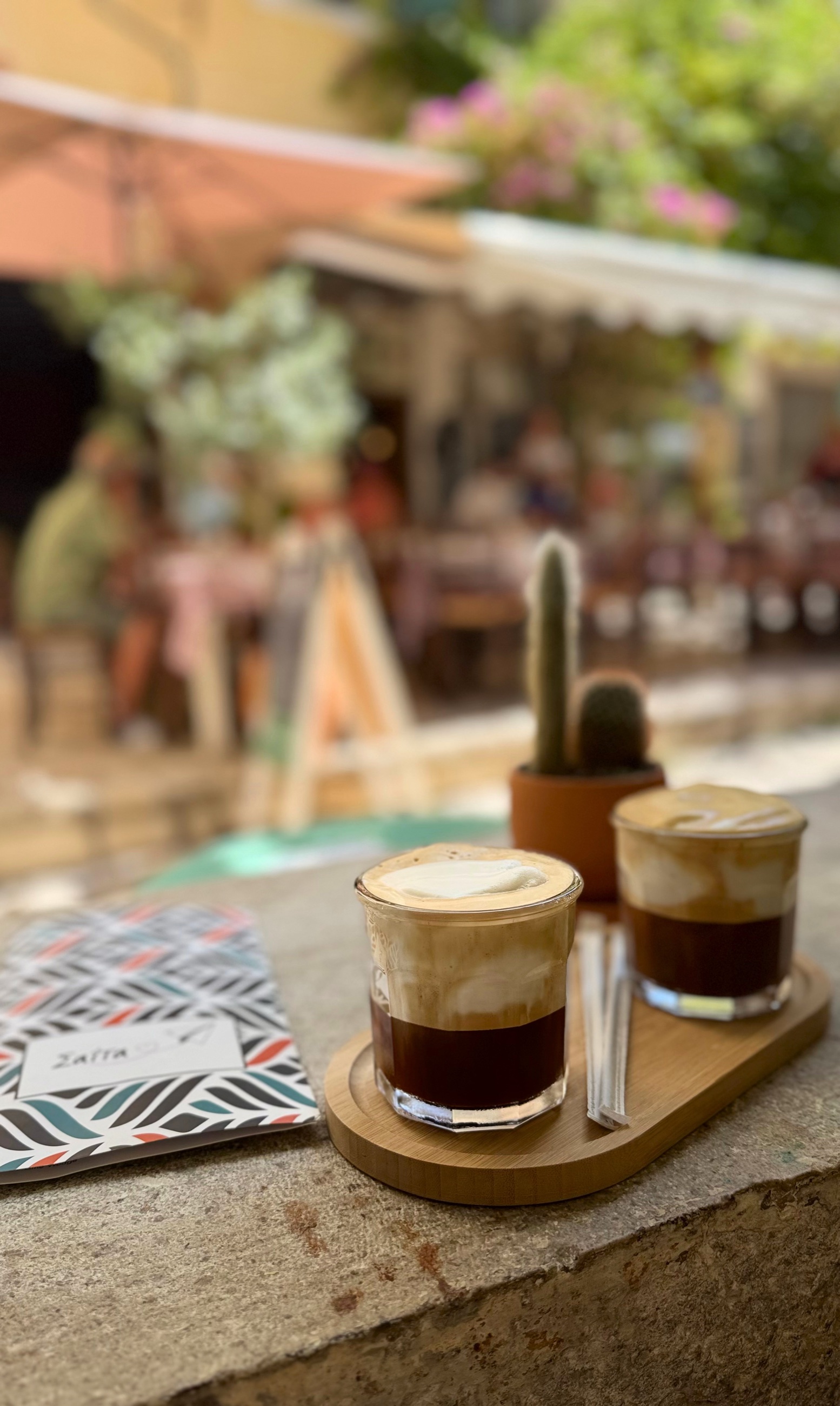 Two freddo cappuccinos on a tray at Saita in Corfu Old Town.