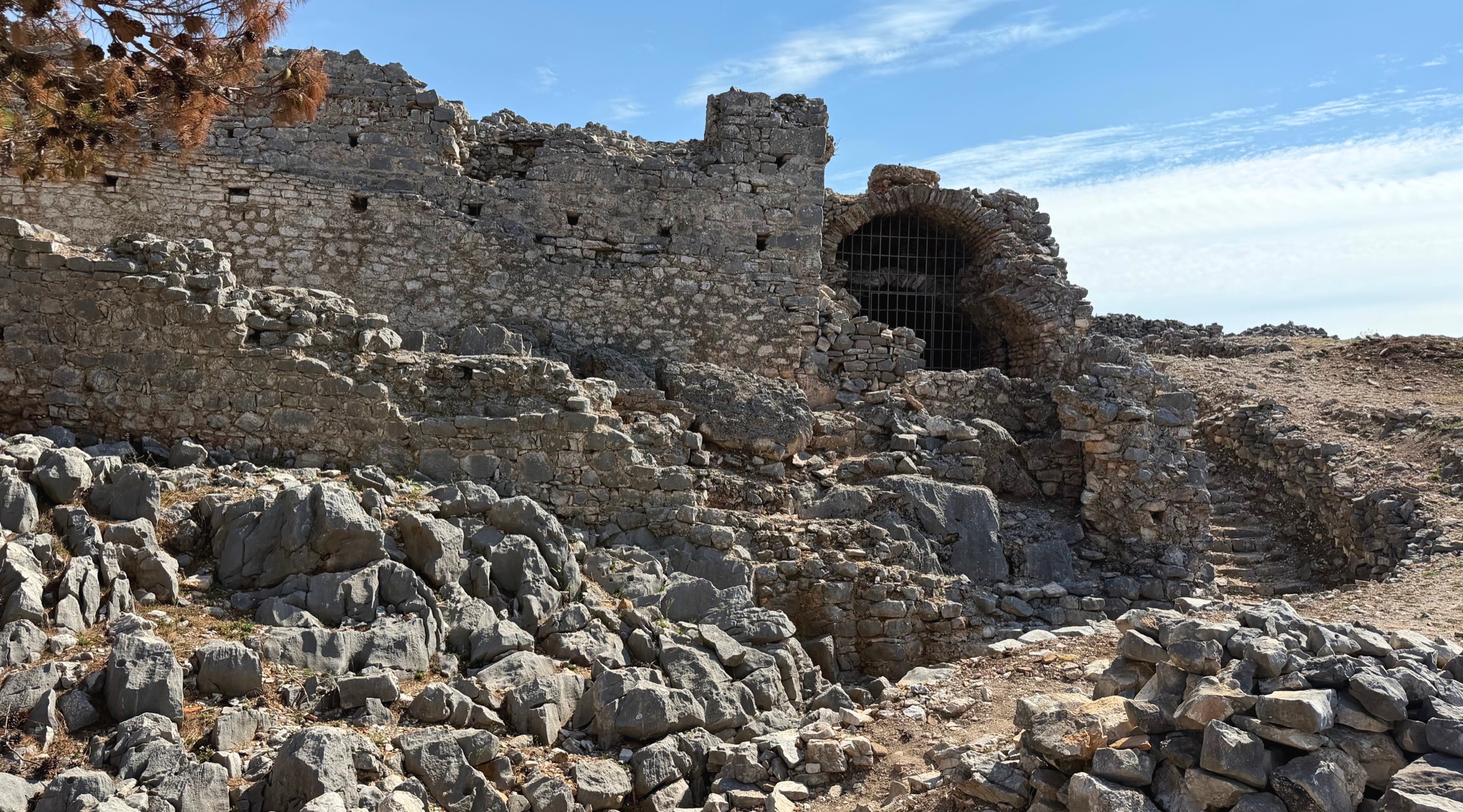Collapsed stone walls and chambers inside the ruined Monastery of the Forty Saints.