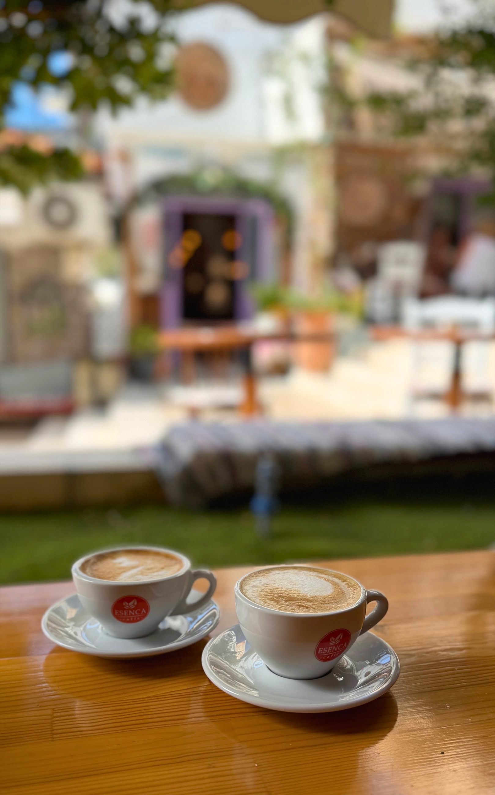 Two cups of coffee on a table in Sarandë.