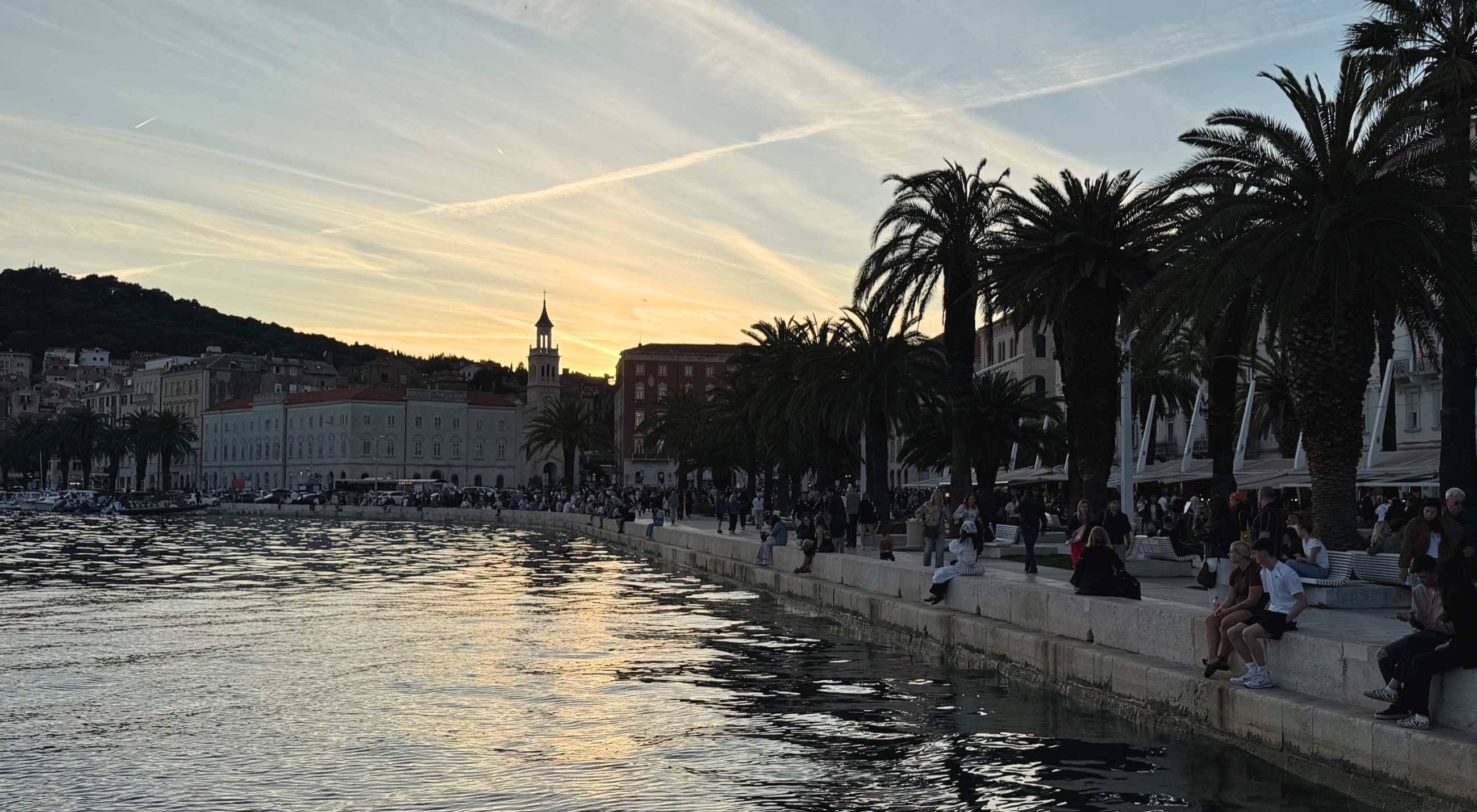 Evening along Split's Riva with waterfront lights and the final week ahead