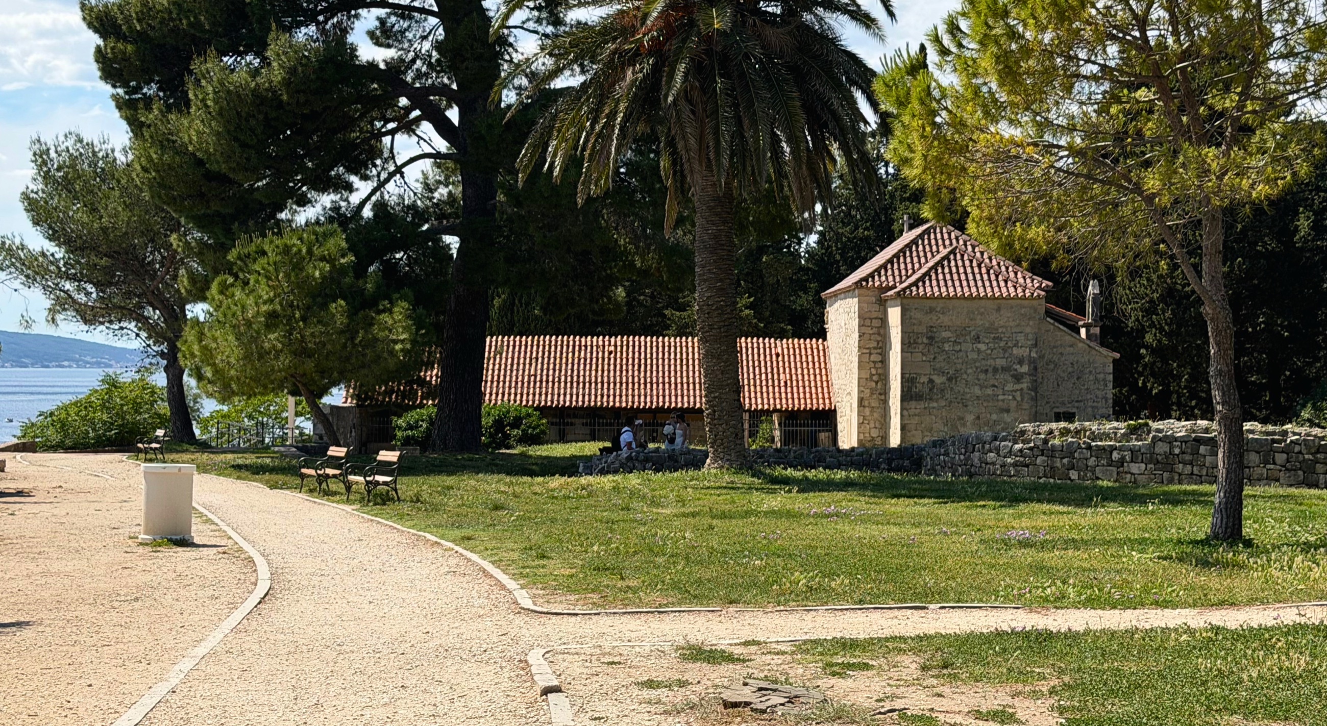 Sustipan Park above the marina in Split with old stone, pine trees, and sea views