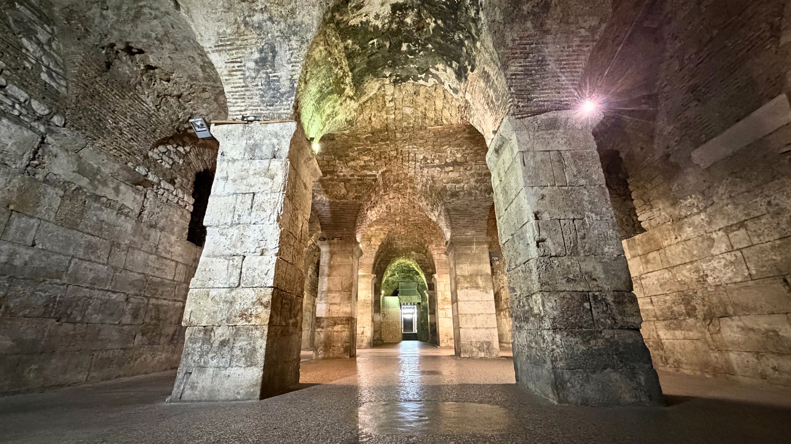 Stone arches and columns in the underground cellars of Diocletian’s Palace