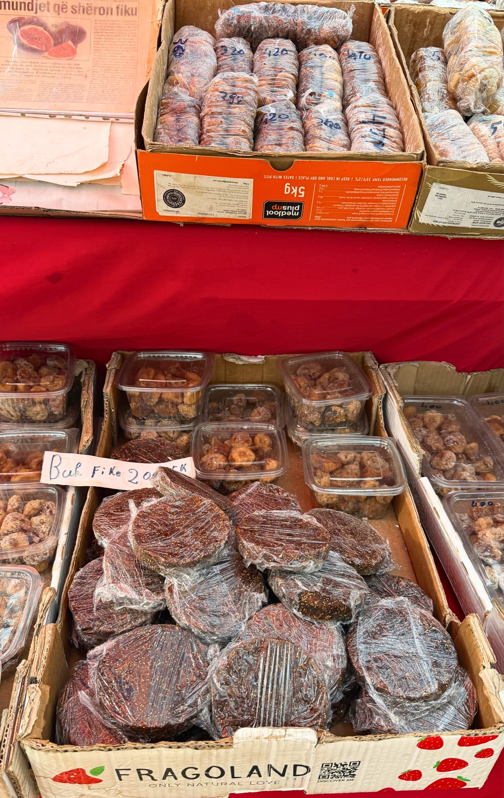 Fig products and other local goods at Tirana's New Bazaar.