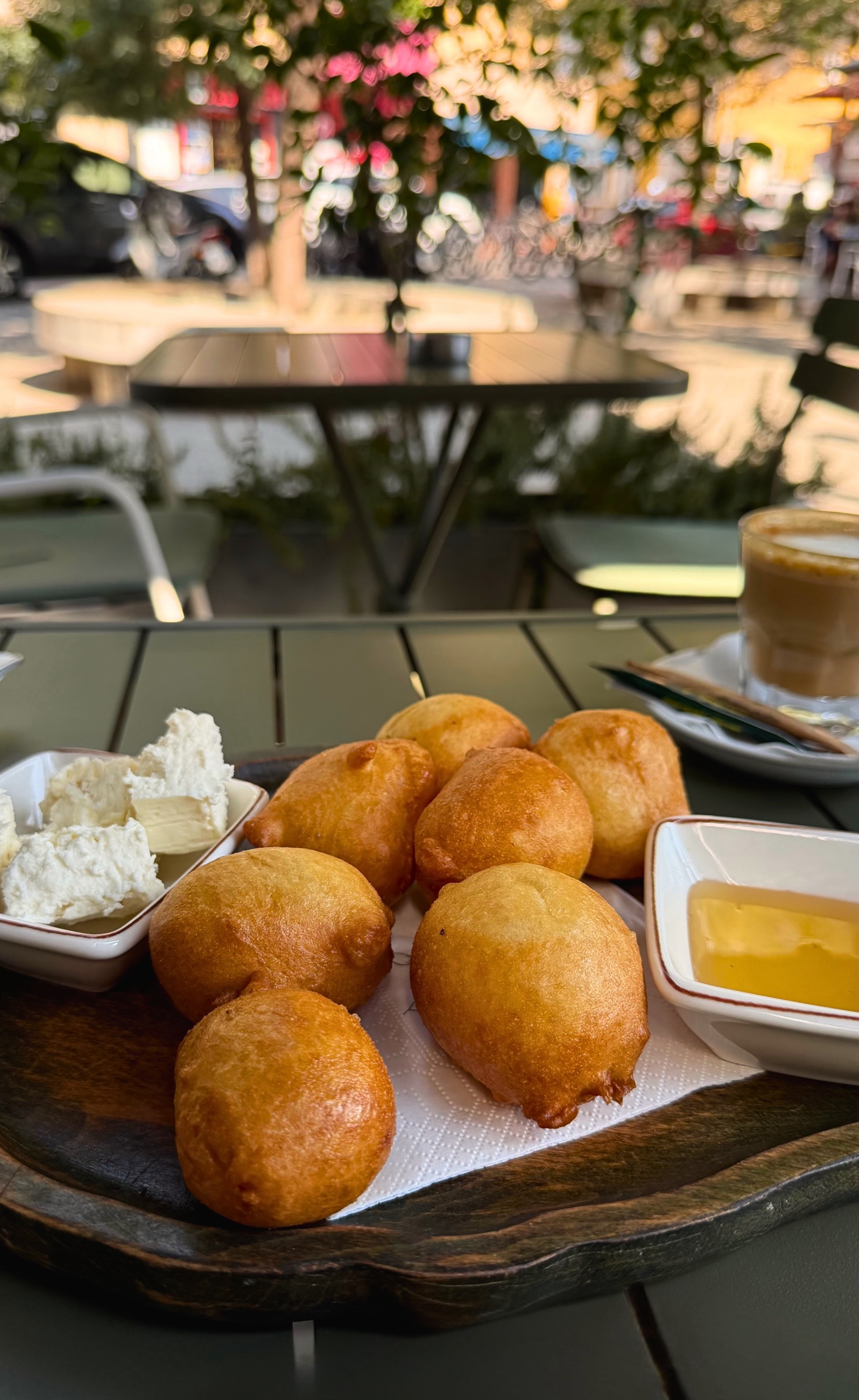 Petulla served with cheese and honey in Tirana.