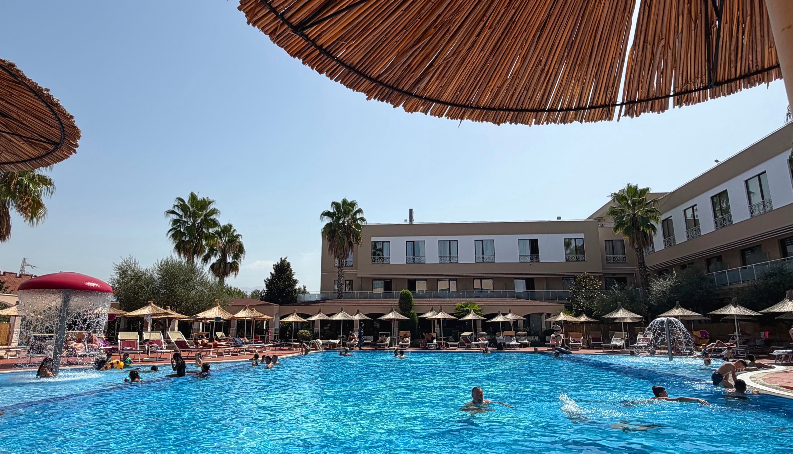 Outdoor swimming pool and loungers at Te Stela Resort on the western edge of Tirana.